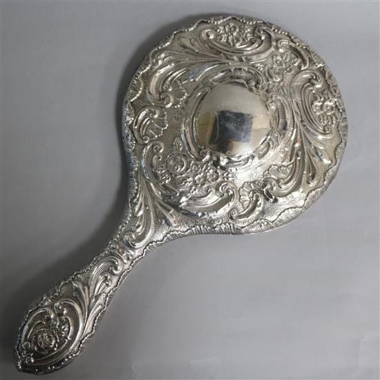 A George V silver hand mirror by William Henry Sparrow, Birmingham, 1913, 23.3cm.
